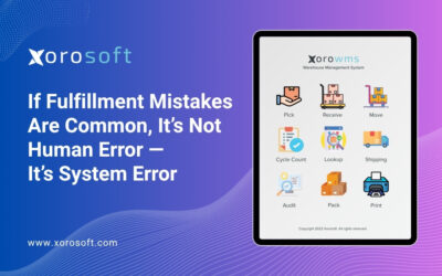 Warehouse worker correcting fulfillment system errors in ERP dashboard